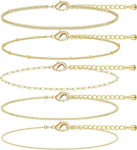 A golden five - piece set Chic Multi - Layered Alloy Bracelet Set - Fashionable Stackable Jewelry - RnR Galore